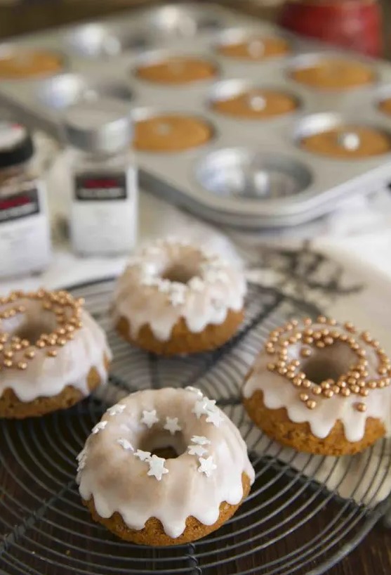 mini bundt wedding cakes with glazing and stars and beads are lovely desserts for a small wedding
