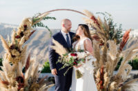 01 This beautiful Santorini wedding was filled with pampas grass, greenery and elegance
