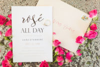 02 The bridal shower stationary was done in metallics, pink and black, with elegant lettering