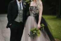 02 The bride was wearing a fantastic strapless A-line black and white wedding dress with a lace bodice, and the groom was wearing a black suit, a grey waistcoat and a grey tie