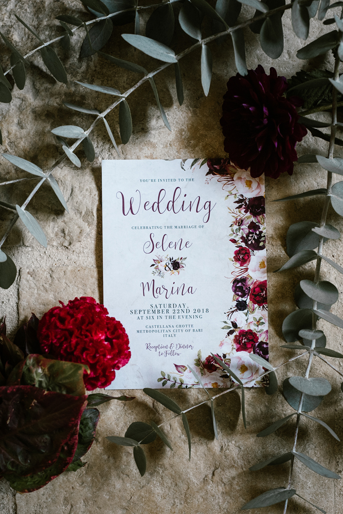 The wedding invitation suite was done with bright florals that were used for decor