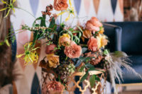 03 The wedding bouquet was a lush one, with muted-toned florals, greenery and bright yellow
