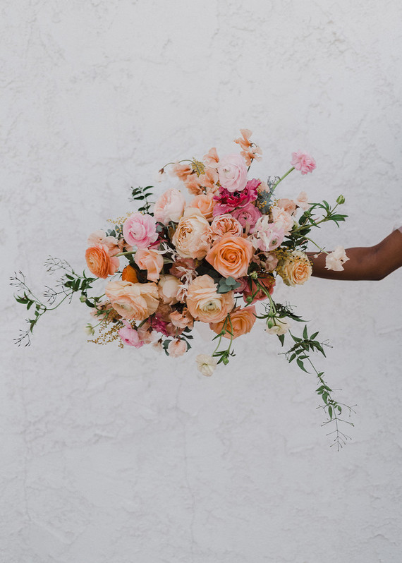 The wedding bouquet was bright and lush and featured the color palette of the wedding shoot