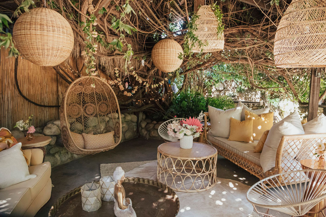 The wedding lounge was totally boho, with wicker touches and rattan furniture