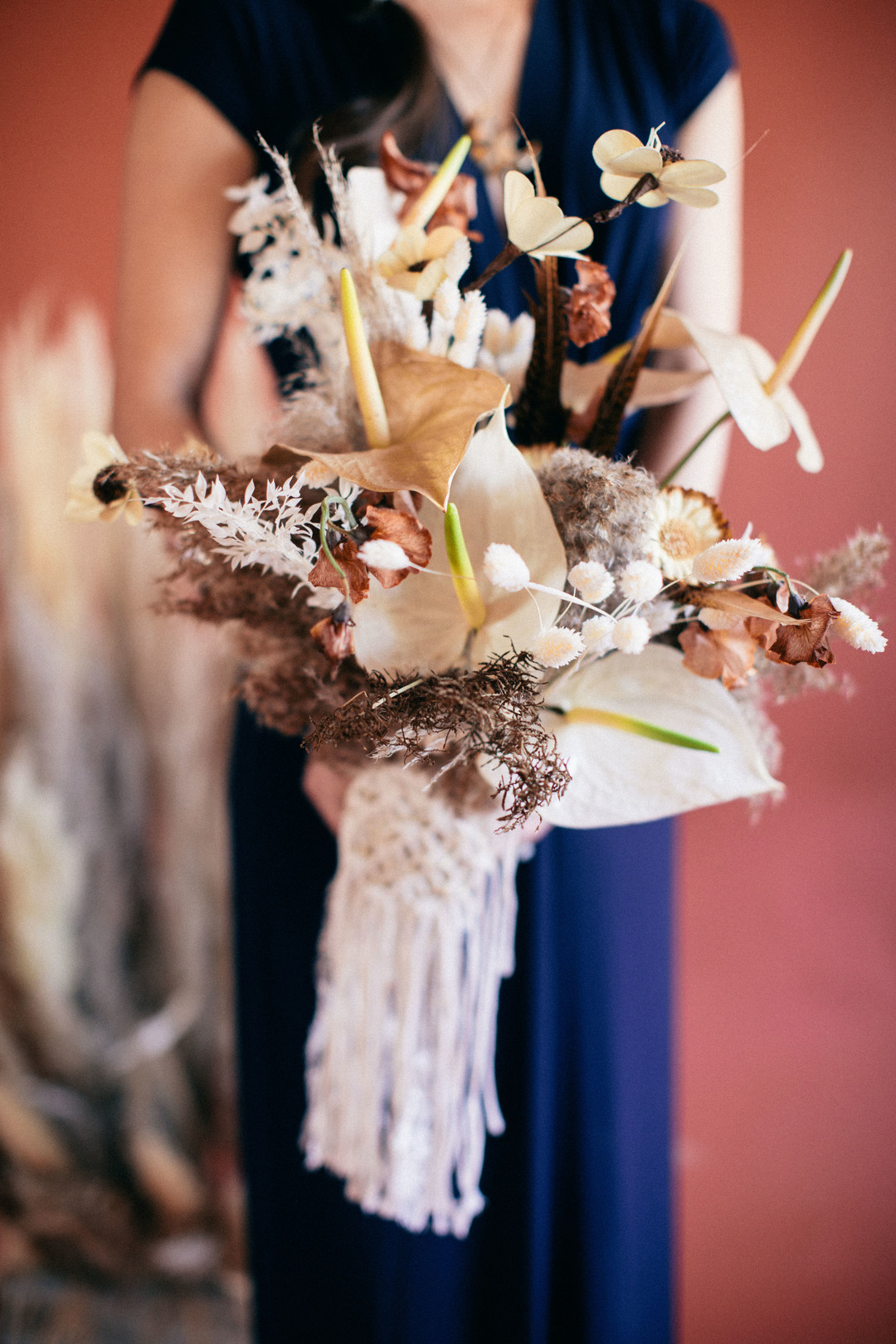Another wedding bouquet was made of dried herbs and leaves, of fresh and dried blooms