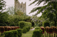 05 The ceremony took place in the castle garden, with elegant chairs and greenery and with the castle as a backdrop