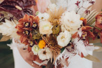 07 The wedding bouquet was a textural one, with lots of various blooms and dried leaves