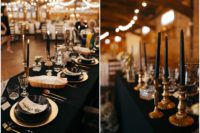 07 The wedding tablescapes were done in black and gold, with black candles in gold candle holders, elegant gold chargers and cutlery