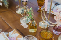 10 Elegant colored glasses, wildflowers, colroed candles helped to create an ambience