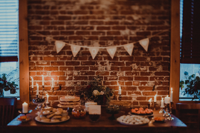The dessert table featured cookies, cupcakes, macarons and a wedding cake
