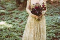 10 a gold lace wedding dress with long sleeves is a very refined option for a fall or moody bride