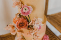 11 The wedding cake was a rust-colored one, with bright blooms for decor