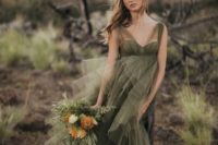 18 a moody green wedding dress with wide illusion straps, a sweetheart neckline and a layered tulle skirt for a moody fall bride