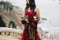 23 a strapless burgundy mermaid wedding dress with a layered skirt and a train is a timeless idea for the fall