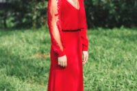 25 a deep red plain wedding dress with lace sleeves and a deep cut neckline for a fall bride who loves color