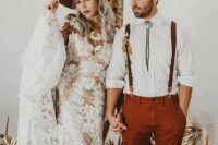 a boho groom’s look with a white shirt, rust pants, brown suspenders and a bolo tie is easy to repeat and looks cool