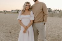 a casual beach groom’s look with a tan sweater and grey pants is a lovely idea for a modern beach wedding