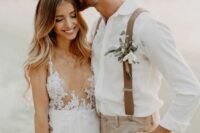 a lovely neutral groom’s look with a white shirt, grey pants, beige suspenders and a boutonniere is a cool idea for a boho wedding