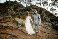 02 The bride was wearing a lace wedding dress with an illusion neckline, long sleeves and the groom was rocking a greye three-piece suit, an aqua shirt, a bow tie and Chelsea boots