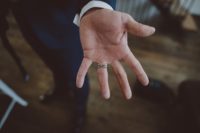 groom with a ring tattoo
