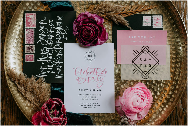 The wedding invitation suite was done with black and pink and modern calligraphy