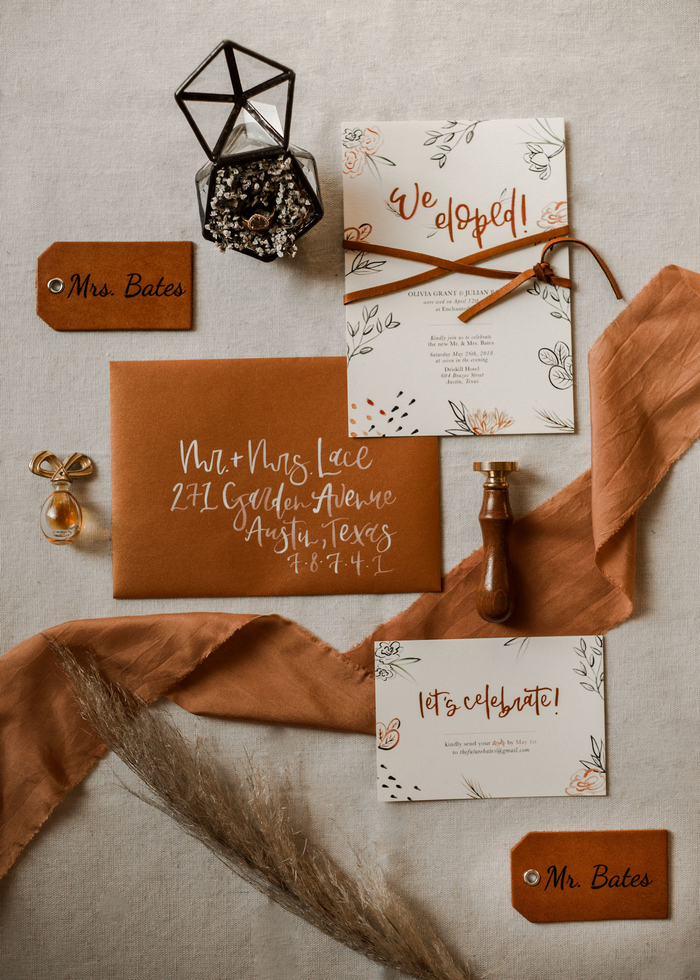 The wedding stationary suite was done with cognac touches, leather and fun lettering