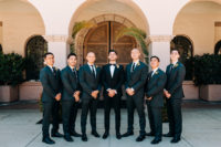 05 The groom was rocking and tuxedo and the groomsmen were wearing suits with ties