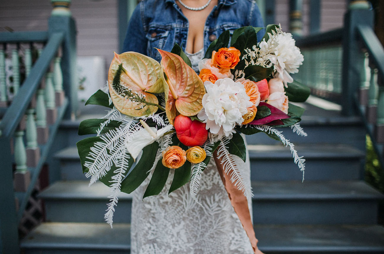 The wedding bouquet was super bright and bold, with large fronds and much texture