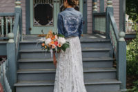 08 The bride covered up with a blue denim jacket that was personalized for her