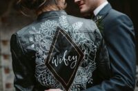12 a beautiful black leather jacket with handpainting is a bold and edgy idea for a modern bride