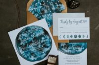18 a bold blue and rust wedding invitation suite done with watercolor and moon phases