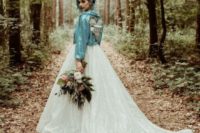 23 a romantic bridal look made edgy with an aqua sequin jacket and aqua-colored hair topped with a crown