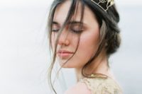 25 a unique gold leaf bridal crown and a wedding dress with matching gold embroidered leaves for a chic look
