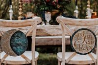 celestial wedding signs on the chairs will be a nice altarnative to usual wedding chair signage