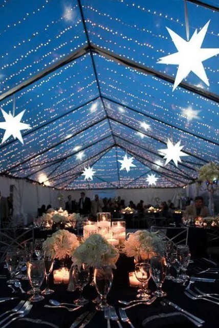 Lights and stars over the reception is a gorgeous celestial or star inspired wedding idea