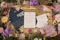 02 The wedding invitation suite was done in navy, creamy and with gold calligraphy that reminds of old fairytale books