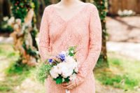 03 The bride was wearing a pink lace knee wedding dress with long sleeves and a V-neckline