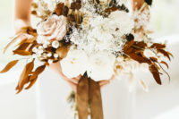 04 The wedding bouquet was full of dried blooms and herbs plus fresh blush and white ones