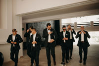 06 The groom and groomsmen were wearing black suits and white shirts plus brown shoes