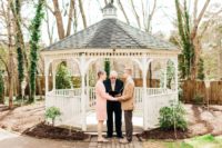 07 The couple shared their love and tied the knot in front of a white gazebo in the garden