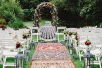 a boho ceremony space for a 70s-inspired wedding