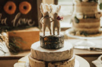 09 A usual wedding cake was substituted with a cheese tower and funny mice toppers