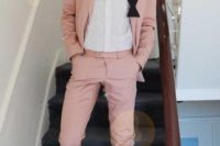 09 a pink suit, a white shirt, black shoes and a black bow tie for a fresh and cool summer groom’s outfit