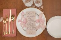 10 Pink petals, refined calligraphy and chic crystal glasses helped to create an ambience