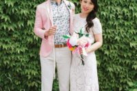 13 a bright summer groom’s look with a floral shirt, a pink jacket, neutral pants, brown moccasins and a belt