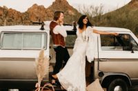 14 a boho lace wedding dress with bell sleeves, fringe and a train for a 70s inspired boho bridal look