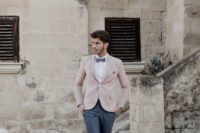 14 a gorgeous groom’s look with graphite grey pants and a bow tie, a white shirt, a pink jacket and neutral shoes