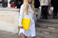 14 a white shirtdress, a white leather jacket, metallic heels and a sunny yellow clutch for a modern wedding