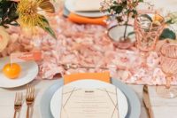 15 a bright 70s inspired wedding tablescape with a coral petal table runner, grey plates, range touches and textural florals