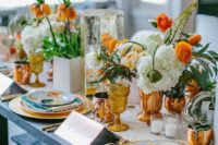 18 a colorful 70s wedding tablescape done with turquoise, gold and white details, lush florals and candles
